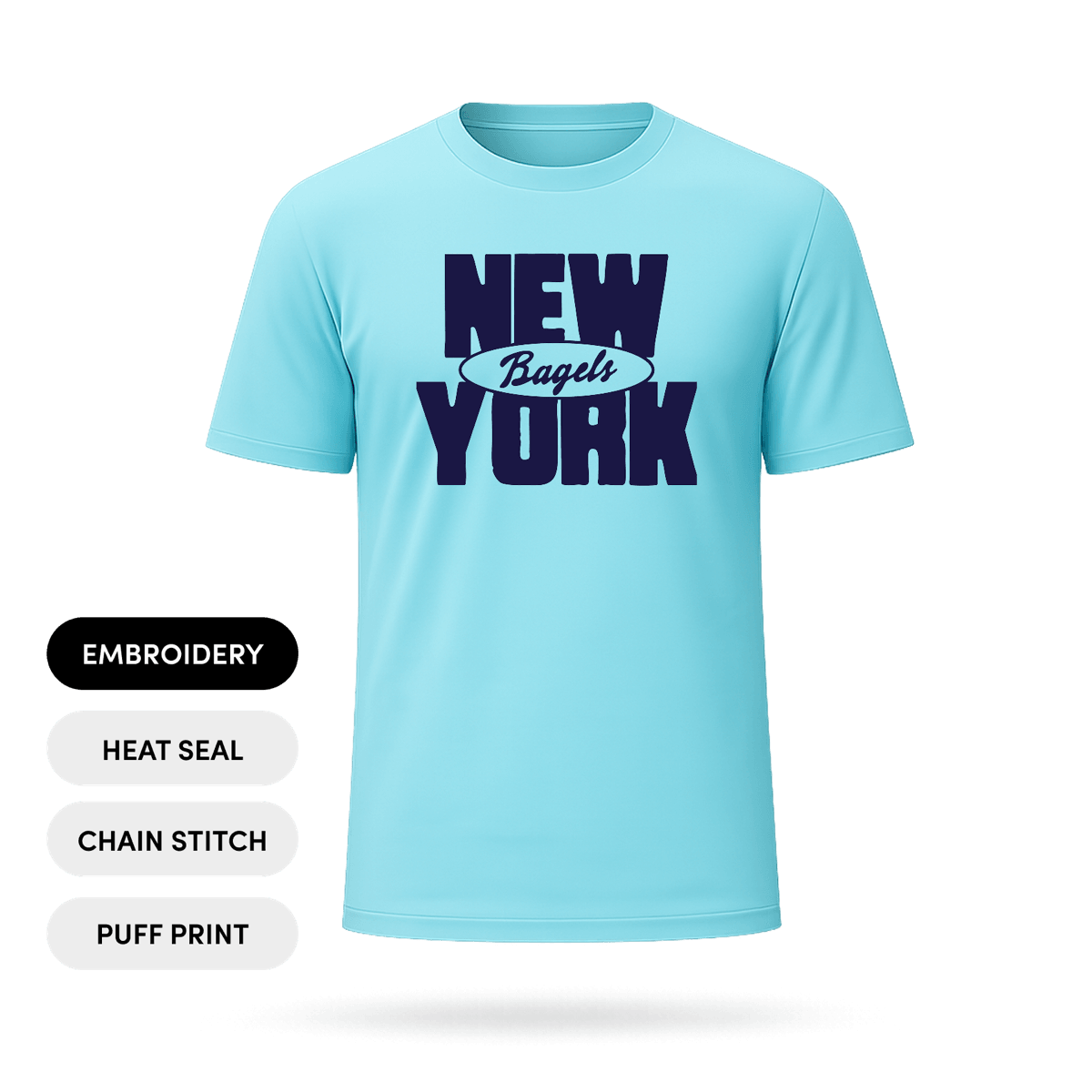 Light blue tee with a navy New York Bagels graphic in the Inkse 3D workspace, with embroidery, heat seal, chain stitch and puff print options